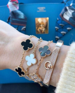 Click to view full screen 18K Vintage Alhambra Five Motifs Clover Onyx Bracelet photo review